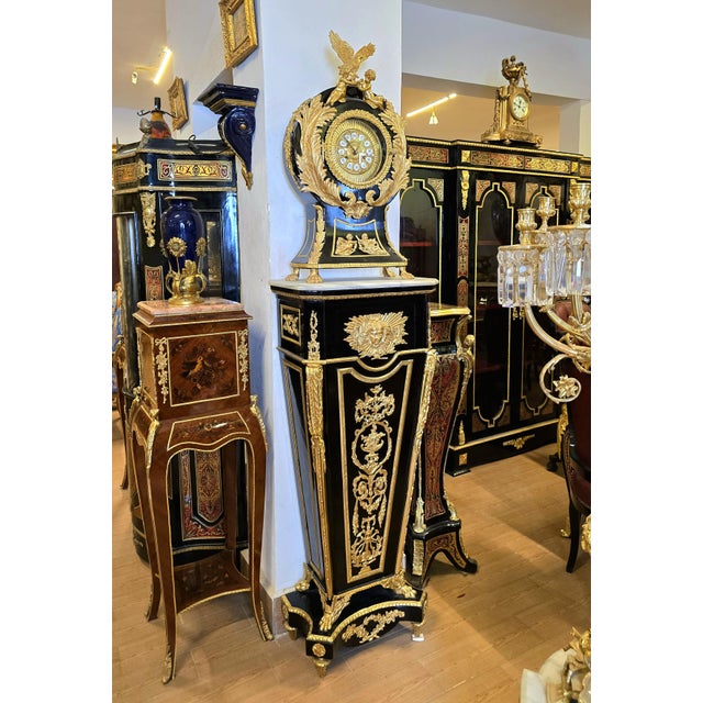 Make a dramatic statement with this breathtaking monumental Sevres-style porcelain vase on pedestal, a luxurious piece...