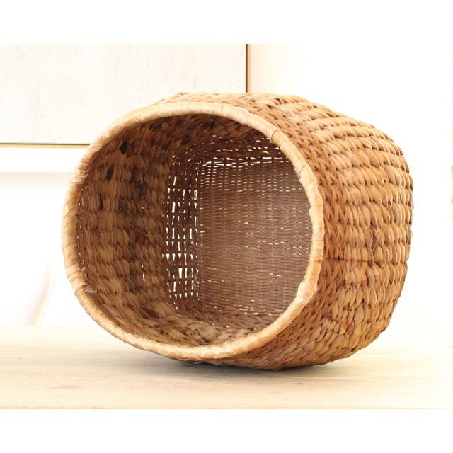 Large vintage hand woven sea grass basket. We love it's organic wide mouth opening.