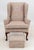 Modern Wingback Arm Chair and Foot Stool, 20th century, with multicolored cotton upholstery. 34.5" H x 33.25" W x 28" D;...