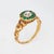 Stylish antique Victorian diamond & emerald ring (circa 1860s) crafted in 18 karat yellow gold. 1 old mine cut diamond is...