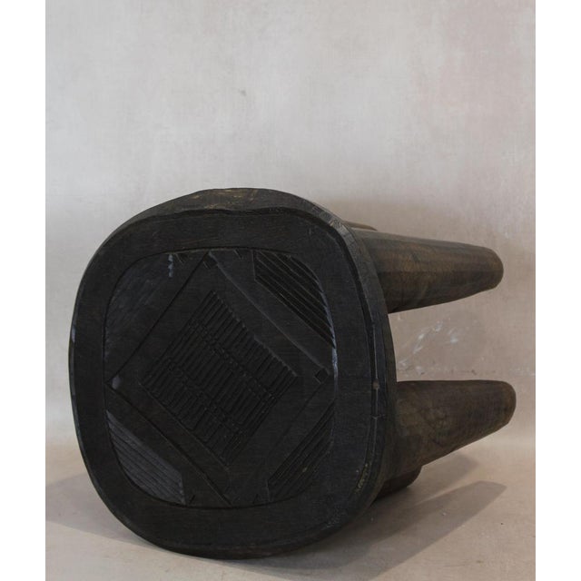 Nupe Stool - This is a large fabulous Hand Carved Wood Stool from the Nupe People of Nigeria. These stools are hand carved...