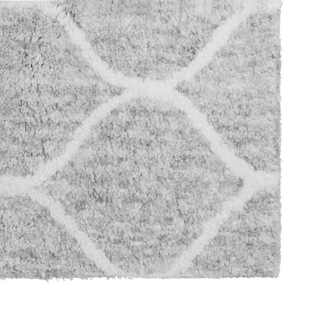 Add irresistible softness to your floors when you cover them with this luxurious Shaggy rug. This soft colored area rug...