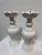 Design Plus Gallery presents a Pair of Ceramic Candleholders with Lotus Shape in White. The duo are tall and gleaming...