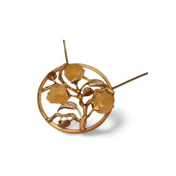 14K Yellow Gold Diamond Topaz Smokey Quartz Leaf Pendant. This elegant pendant features four hand-carved natural topaz...