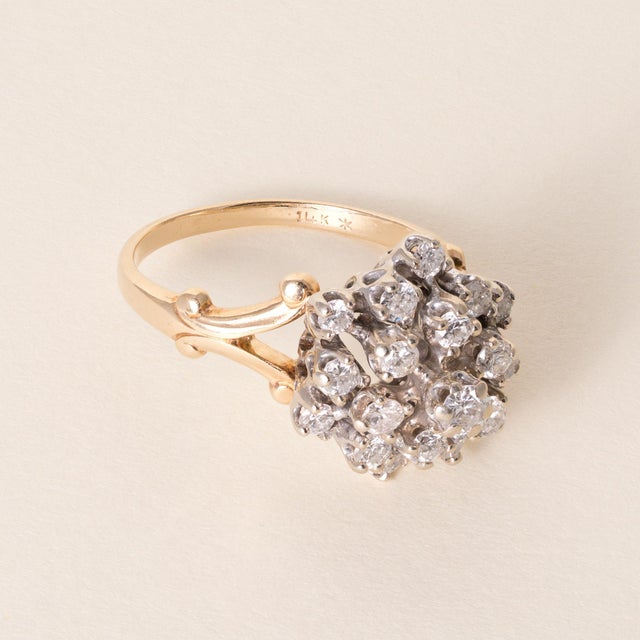 Diamond Vintage Diamond Cluster Cocktail Ring 14K Two-Tone Gold A classic vintage diamond cluster cocktail ring crafted in...