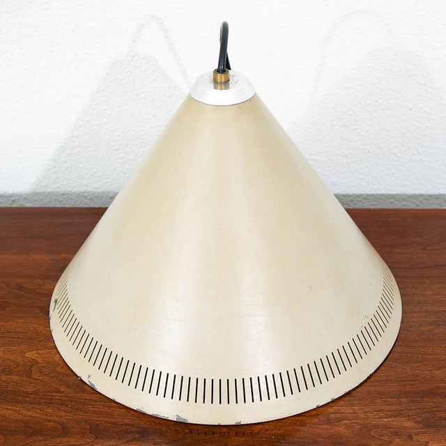 Danish modern cone pendant light designed by Jo Hammerborg for Fog & Morup. This lamp will need to be hardwired into a...
