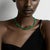 Brazilian green agate, faceted into heishi beads with natural variation in tone, some deeper, some more translucent. Two...
