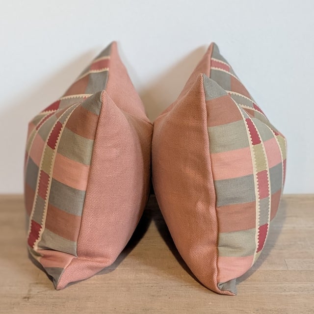 Bennison Toothcheck lumbars in pretty coral/pink with muted greens. Coordinating coral linen backs. Invisible zippers and...