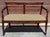 A two seater Edwardian Solid Walnut settee with an upholstered seat, commonly referred to as a "gossip bench" Design...