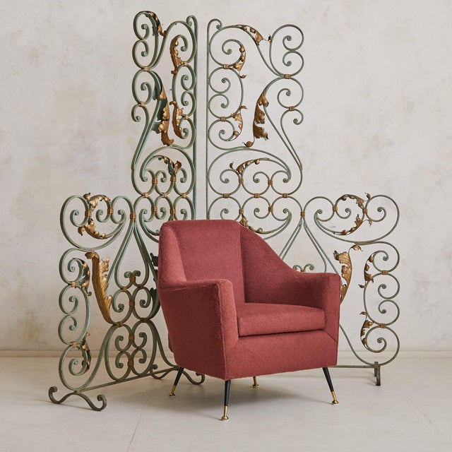 A pair of 1940s French Art Deco wrought iron screens, featuring scrolling motifs in an original verdigris-painted finish...