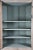 A monumental mid-18th century corner cabinet of architectural scale and sophistication, likely New England in origin, with...