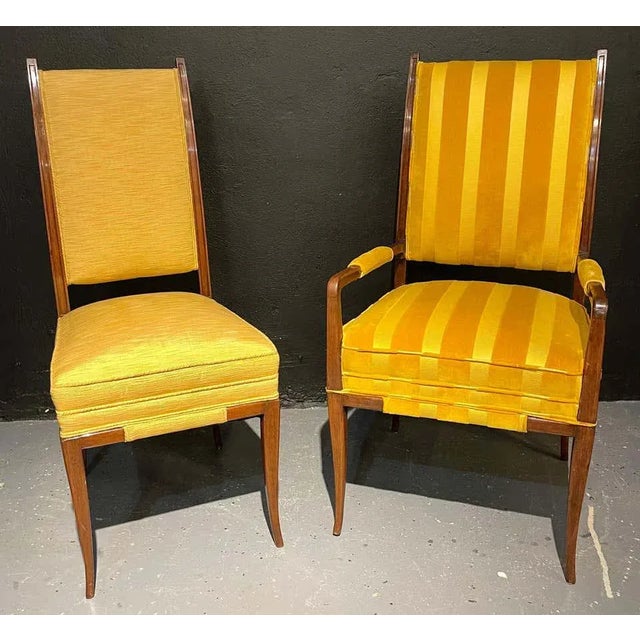 Six Parzinger dining chairs each having high backs and strong frames in the original fabric. A pair of arms and four sides...