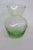 This classic vase is made of glass. This vase has a lovely small silhouette, it is made in a wonderful light green. The...