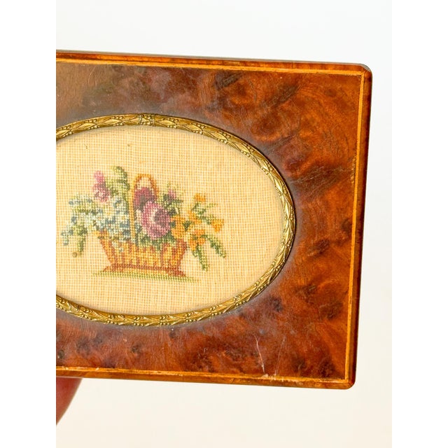 The sweetest keepsake box made out of burlwood, with a delicate brass framed micro cross stitched insert depicting a...
