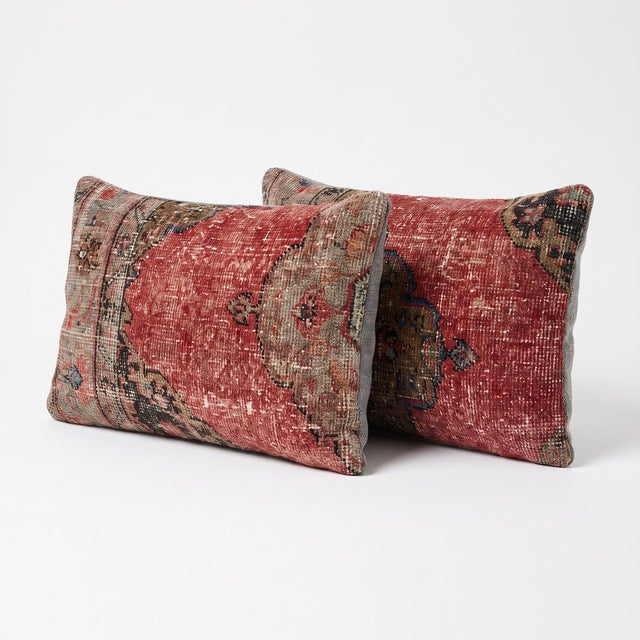 This beautiful 16'' x 24'' pillow cover set was made from authentic Turkish rug pieces. Bright colors of wool adorn the...