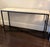 Modern steel and pine console or sideboard. In as-new condition. I don’t know the designer or brand. I bought this at an...