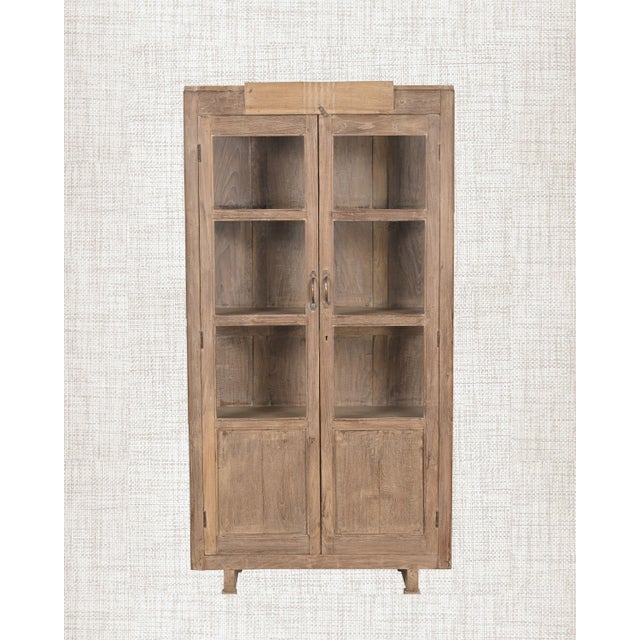 Some pieces have the calm of something that has never needed to prove itself. This antique Indian teak armoire is one of...