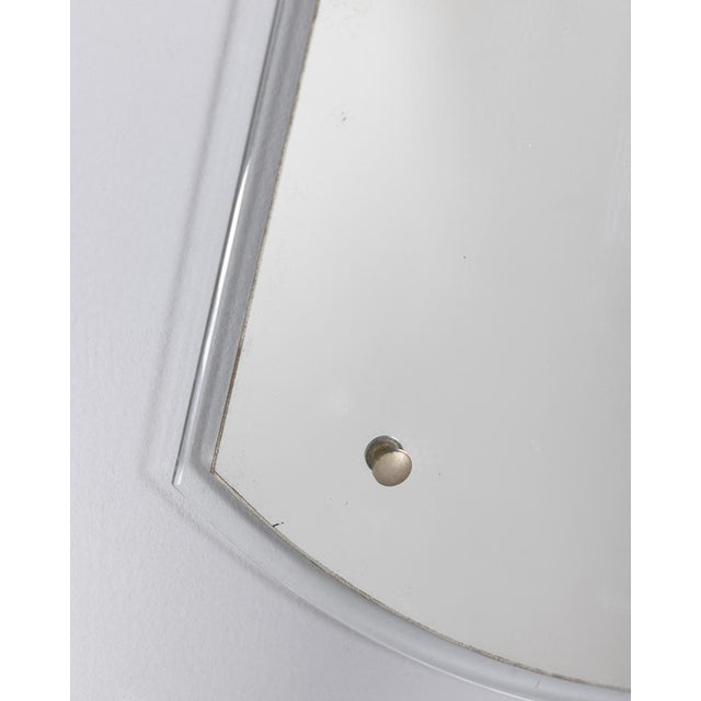 Drop-shaped wall mirror made entirely of glass, Italian design, 1960s.