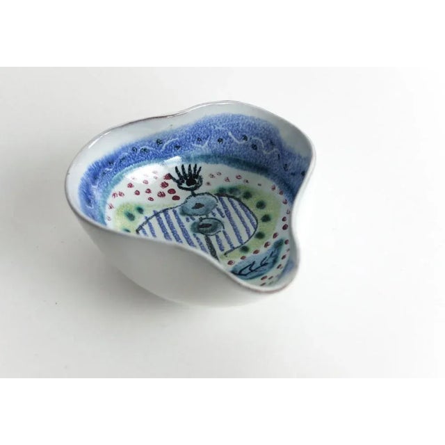 Small ceramic bowl by Jane Wåhlstedt & Nils Larsson. Signed underneath. This piece has an attribution mark, I am sure that...