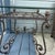 Metal Vintage Wrought Iron French End Table Beveled Glass Top Ornate Rectangular For Sale - Image 7 of 8