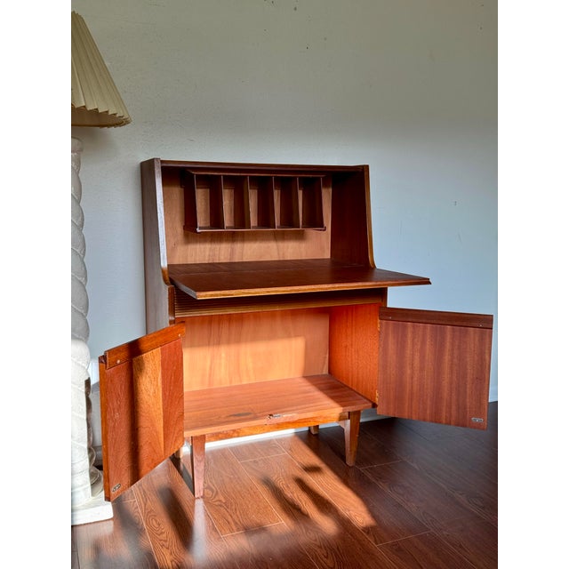 A cute mid century secretary desk/cabinet made by Elliots of Newbury, circa 1960s. A fantastic little desk perfect for...