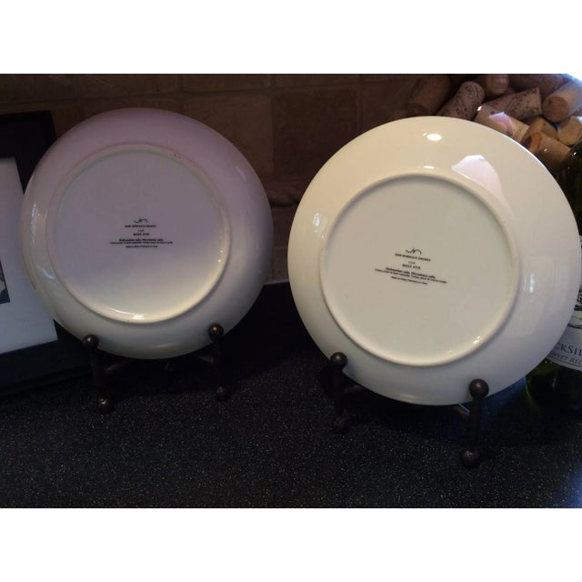 John Newdigate designed these stunning Mid Century Styled Decorative Plates for West Elm. Graciously styled plate holders...