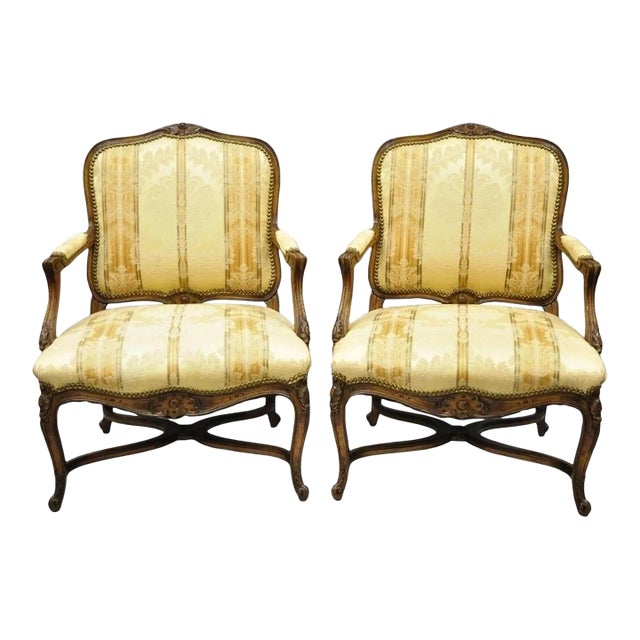 Vintage French Country Louis XV Style Carved Walnut Lounge Arm Chairs - A Pair For Sale