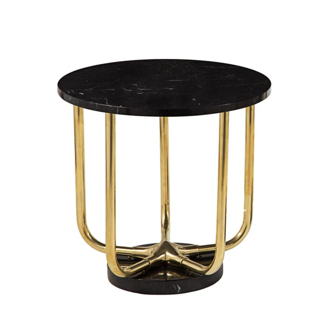 This piece is available separately in different brass and marble finishes.