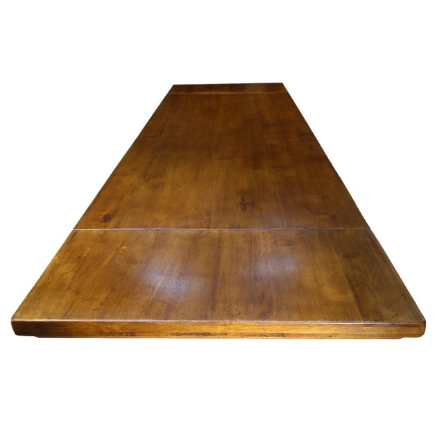 Our 18th Century style Italian Old Walnut trestle table with end extensions. The sophisticated Mediterranean "Bocci"...