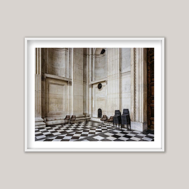 A detailed photograph captures the grandeur of the portico entrance to St. Paul’s Cathedral in London. Designed by the...