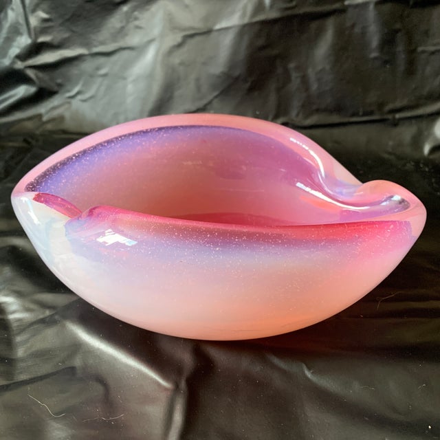 This is a vintage Murano pink opaline glass bowl or ashtray by Archimede Seguso, distinguished by its asymmetrical, folded...