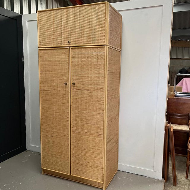 Vintage Rattan wardrobe with upper storage cupboard Upper storage space is removeable Brass handles Full length hanging...