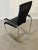 This chair is in very nice condition and has the coveted leather seat cushions. It is the version with the Aplati tube,...