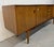 This listing is for a Mid-Century Modern G-Plan Walnut Sideboard. Featuring a straight line design, cabinet doors on the...