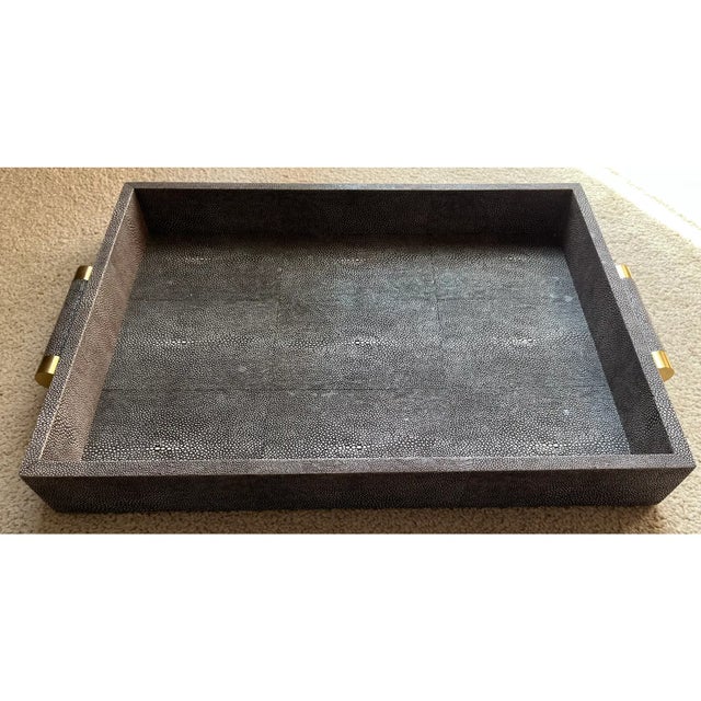 This gorgeous large faux shagreen leather tray features brass end handles as shown. Makes a wonderful bar or serving tray...