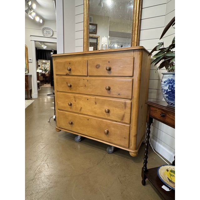 This 19th Century pine dresser has a lovely patina. The wood has a warm glow, that is accented perfectly by the darker...