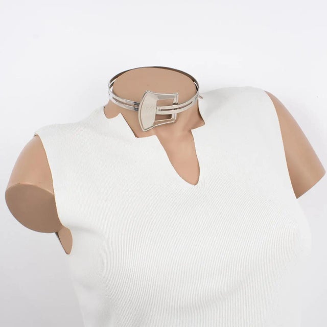 This stunning modernist rigid collar necklace boasts a silvered metal articulated neckband with metal all textured and...