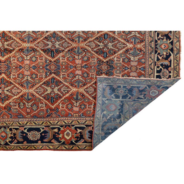 This magnificent Antique Persian Mahal rug features a rare and rhythmic all-over diamond lattice pattern. Set against a...