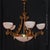 A monumental and highly decorative Art Deco brass and glass chandelier dating to circa 1930, distinguished by its...