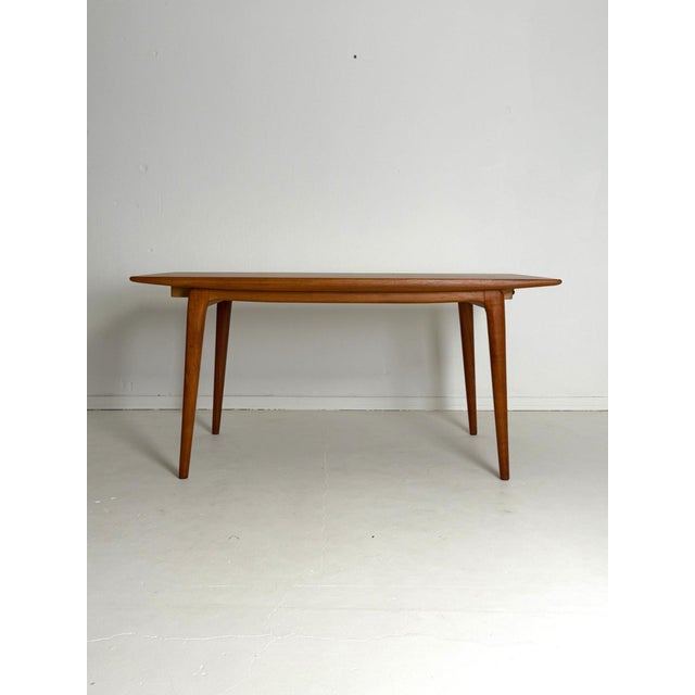Alfred Christensen Boomerang Extending Teak Dining Table, 1960s A rare Boomerang extending dining table designed by Alfred...