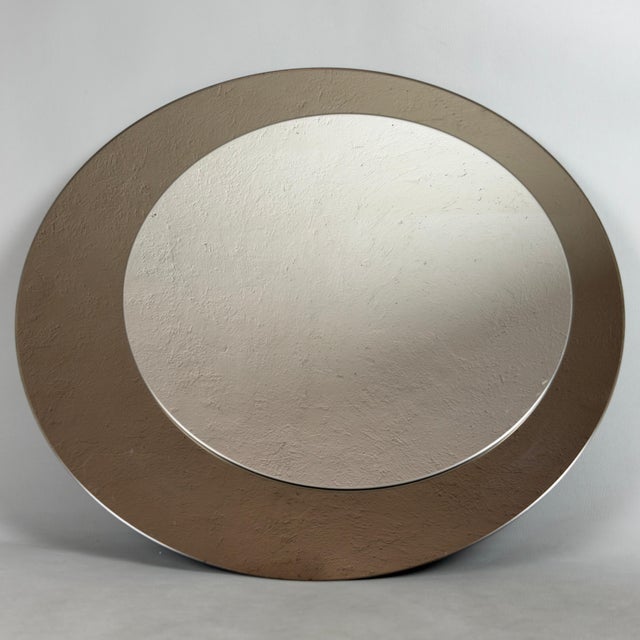 A high-design piece by Rimadesio, a symbol of Italian excellence in furnishings. This mirror perfectly embodies the...