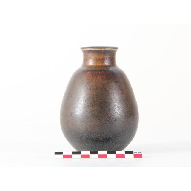 Small Vintage Vase by Erik & Ingrid Triller for Tobo Stengods Verkstad, in Flawless conditions. This piece is attributed...
