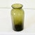 Dimensions: 11 ¾” H x 5 ¼” W x 5 ¼” D A wonderful green glass pickling or truffle jar from 18th century France. These...