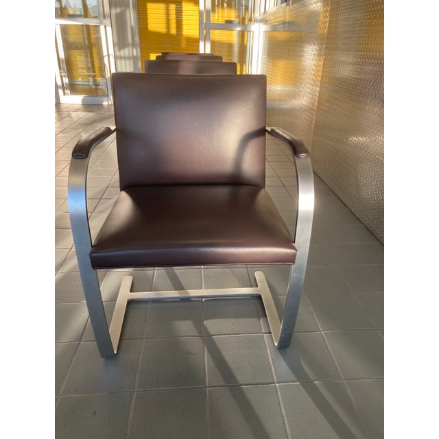A very fine set of vintage BRNO chairs in brown Spinneybeck leather designed by Ludwig Mies Van der Rohe and produced by...