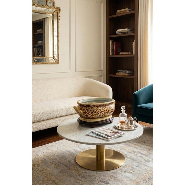 Elevate your space with this stunning and exceptionally rare vintage Chinese-style oval porcelain fishbowl planter,...