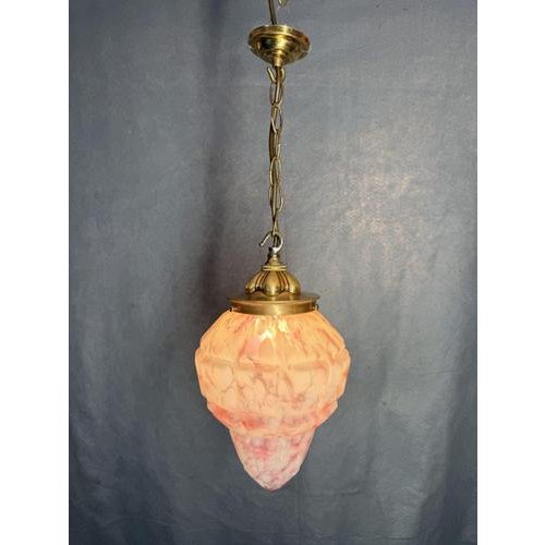 Eye-catching 1930s pendant light featuring a beautiful mottled orange and white glass shade designed to resemble marble....