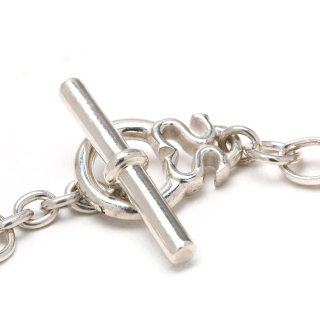 Length: 7.5 in Chain Width: 5.2 mm Weight: 6.6 dwts. / 10.3 grams Stamps: "925 Slane" SKU: B1303 A Couple Of Things to...