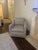 A traditional-style swivel chair with exceptional modern comfort. Sloping side wings and a crisp, tailored skirt recall...