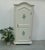 Hallway wardrobe, closet for guest room or also as a pantry for the kitchen, etc. with one cream-white door featuring a...