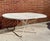Unmarked by Woodard 72 inch length 42" Width It seats up to 6 people Integrated umbrella hole 8-spoke base design for...